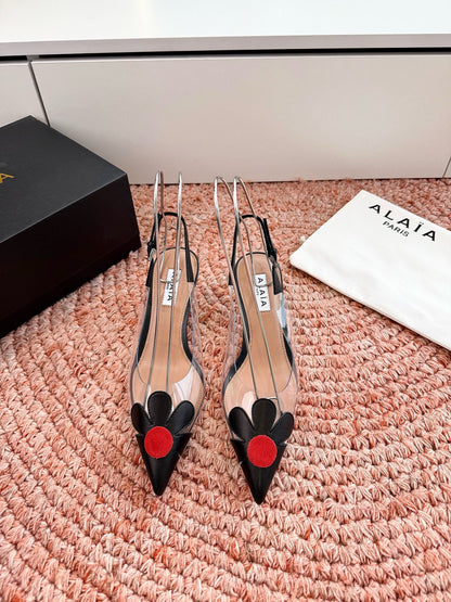 ALAIA 26S POINTED-TOE SLINGBACK HEELS IN BLACK LAMBSKIN AND TRANSPARENT PVC