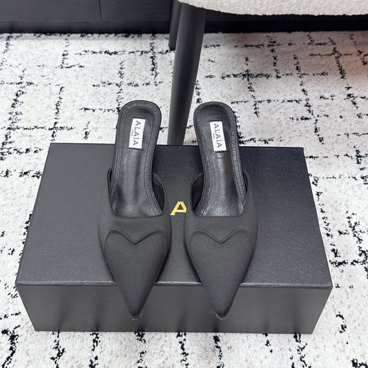 ALAIA 26S HEELED MULES 65 MM IN BLACK SATIN