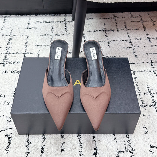 ALAIA 26S HEELED MULES 65 MM IN CHOCOLATE BROWN SATIN