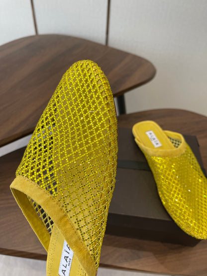 ALAIA 26S FLAT MULES IN DARK YELLOW SUEDE AND MESH RHINESTONE-EMBELLISHED
