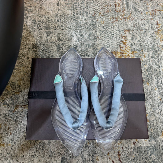 ALAIA 26S THONG SANDALS IN PASTEL BLUE SATIN AND TRANSPARENT PVC