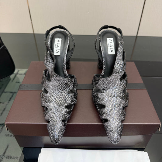 ALAIA 26S HEELED SLINGBACKS IN BLACK PYTHON-EMBOSSED LEATHER