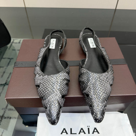ALAIA 26S CUT-OUT SLINGBACK FLATS IN BLACK PYTHON-EMBOSSED LEATHER