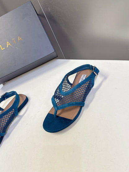 ALAIA 26S FLAT MESH THONG SANDALS IN PETROL BLUE SUEDE