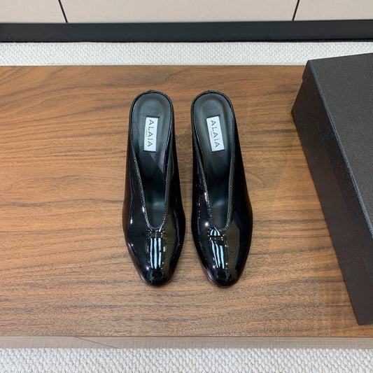 ALAIA 26S WEDGE MULES 70 MM IN BLACK GLOSSY CALFSKIN