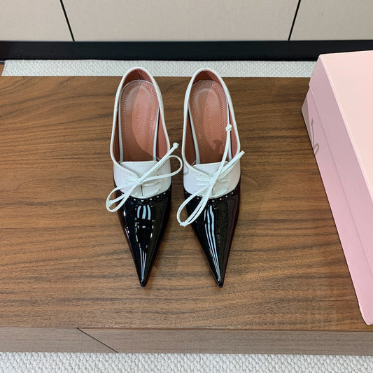 ALAIA 26S LACE-UP HEELED 105 MM IN BLACK AND WHITE GLOSSY CALFSKIN
