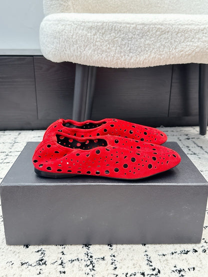 ALAIA 26S FLAT SLIP-ONS IN RED SUEDE WITH OPENWORK PATTERN