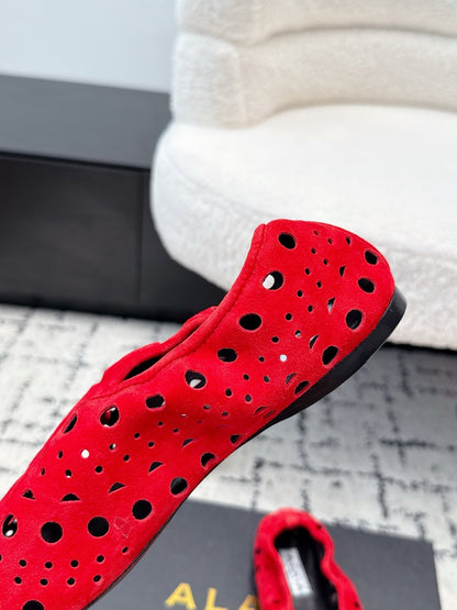 ALAIA 26S FLAT SLIP-ONS IN RED SUEDE WITH OPENWORK PATTERN