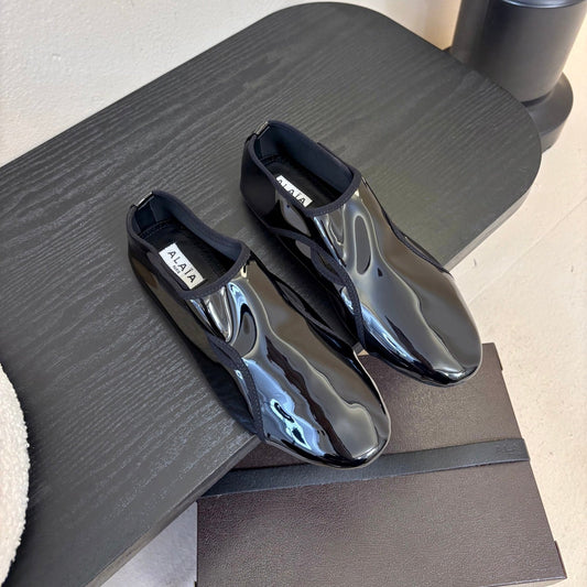 ALAIA 26S FLAT LOAFERS IN BLACK GLOSSY LAMBSKIN