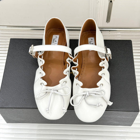 ALAIA 26S MARY JANE FLATS IN WHITE LAMBSKIN WITH BOW