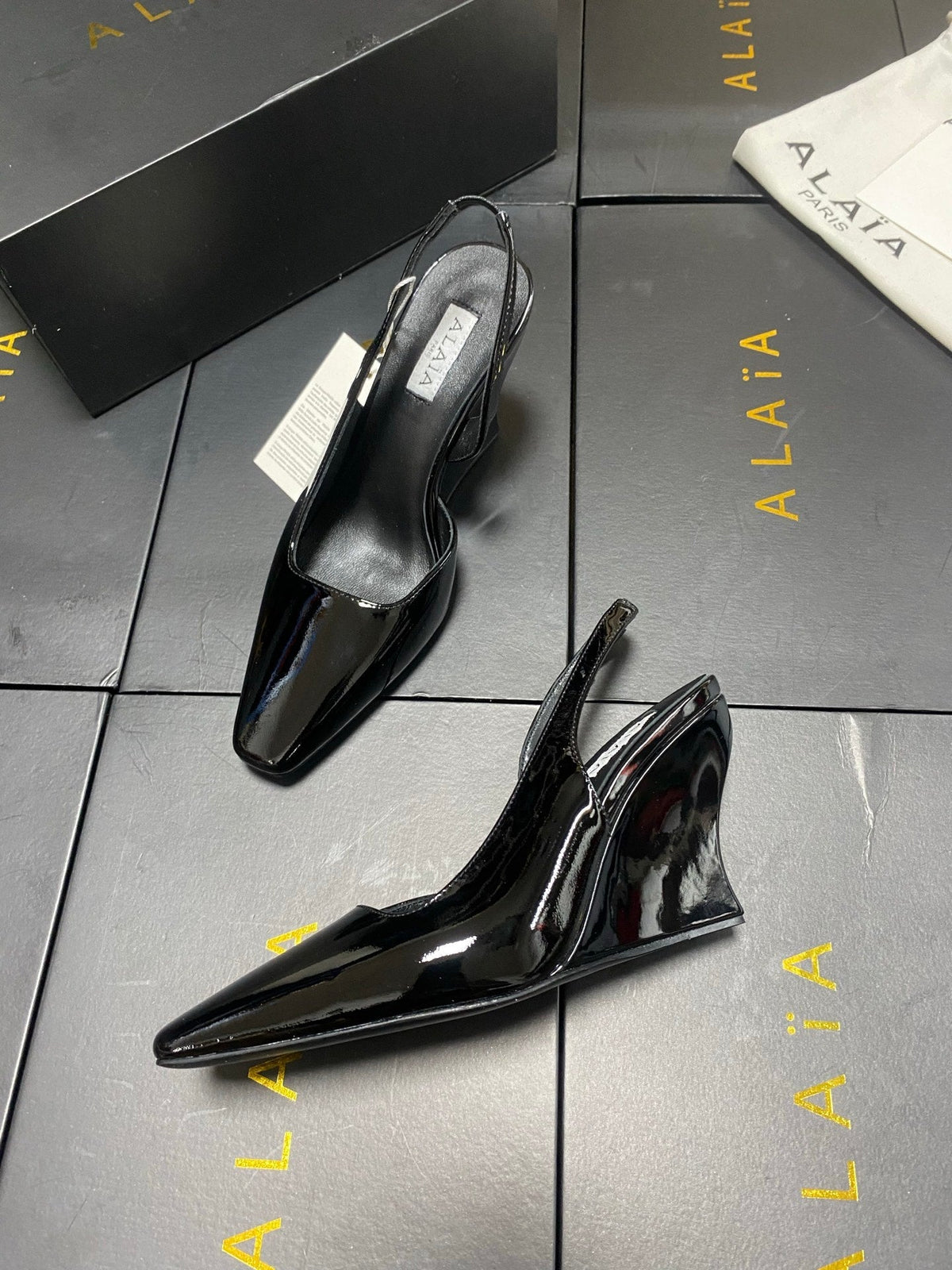 ALAIA 26S WEDGE SLINGBACKS 95 MM IN BLACK PATENT CALFSKIN