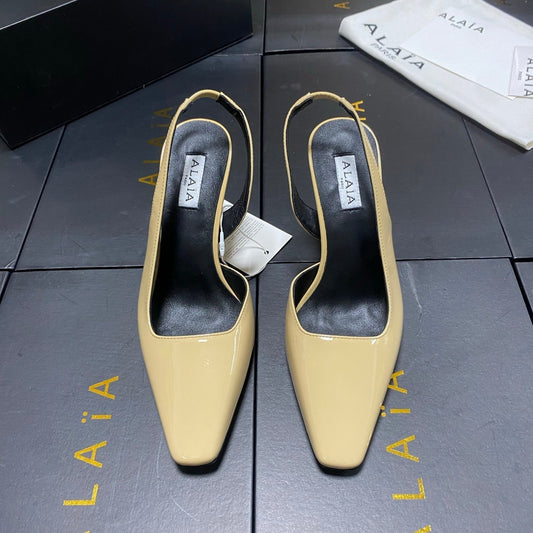 ALAIA 26S WEDGE SLINGBACKS 95 MM IN BEIGE PATENT CALFSKIN