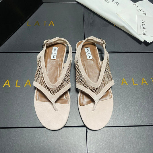 ALAIA 26S FLAT MESH THONG SANDALS IN BEIGE SUEDE