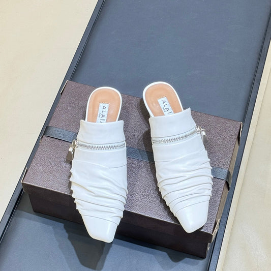 ALAIA 26S PLEATED MULES IN WHITE LAMBSKIN