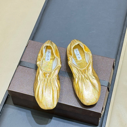 ALAIA 26S BALLET FLATS IN GOLD LAMBSKIN