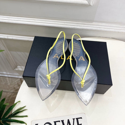 ALAIA 26S POINTED-TOE THONG SANDALS IN YELLOW AND TRANSPARENT PVC