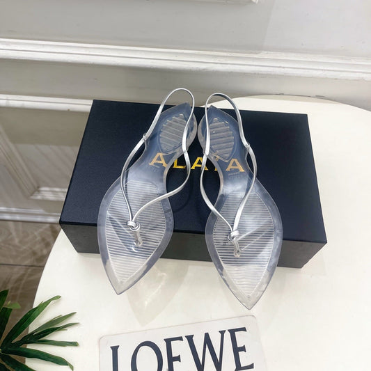 ALAIA 26S POINTED-TOE THONG SANDALS IN SILVER AND TRANSPARENT PVC