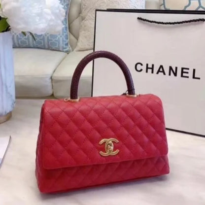 Chanel Grained Calfskin Maxi Flap Bag with Top Handle