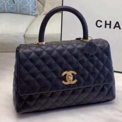 Chanel Grained Calfskin Maxi Flap Bag with Top Handle