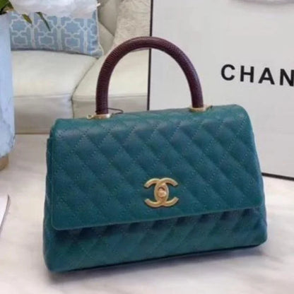 Chanel Grained Calfskin Maxi Flap Bag with Top Handle