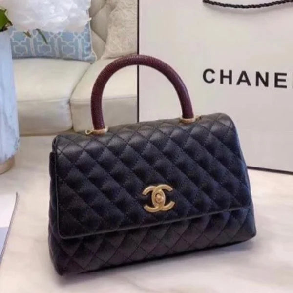 Chanel Grained Calfskin Maxi Flap Bag with Top Handle