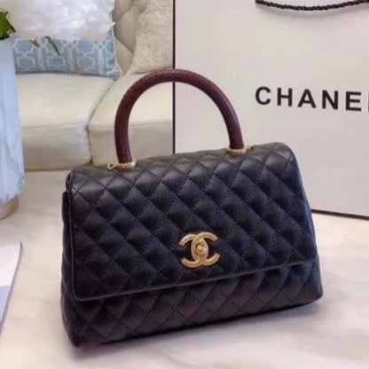 Chanel Grained Calfskin Maxi Flap Bag with Top Handle