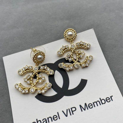 Gold pearl earrings