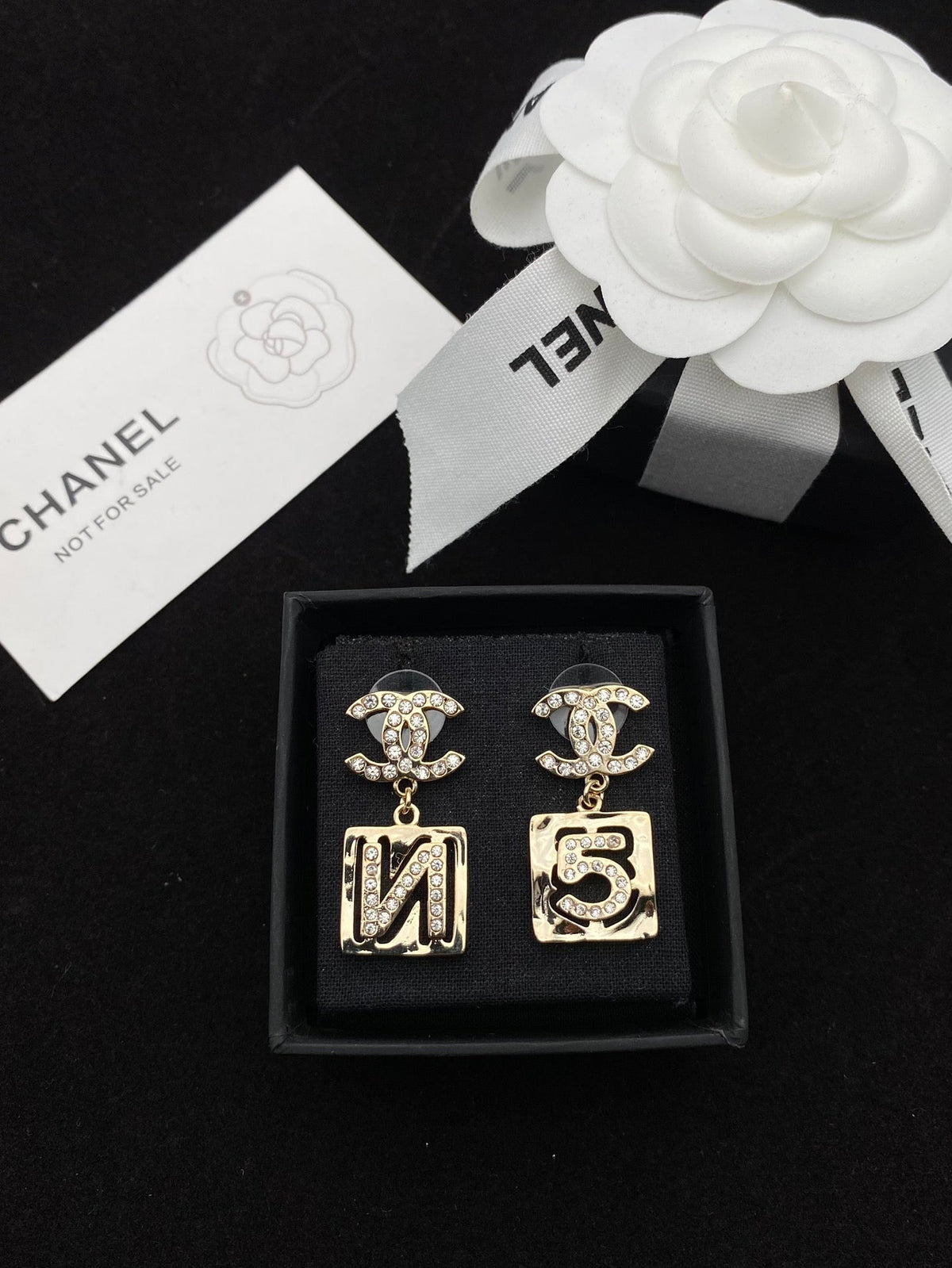 number 5 earrings