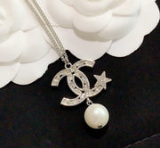 pentagram pearl earrings