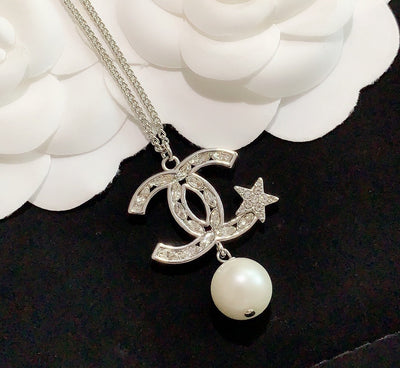 pentagram pearl earrings