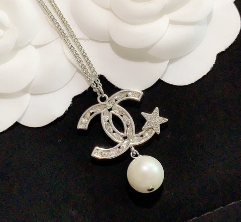 pentagram pearl earrings