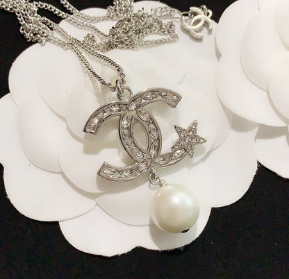 pentagram pearl earrings