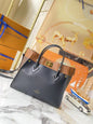 Leather and canvas combined handbag lbcase