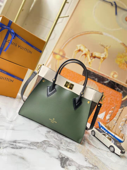 Leather and canvas combined handbag lbcase