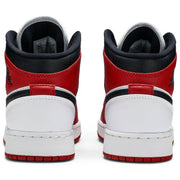 Nike Air Jordan 1 Mid GS 'Chicago white toe'.