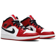 Nike Air Jordan 1 Mid GS 'Chicago white toe'.