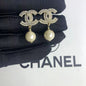 Zircon inlaid pearl steel needle earrings