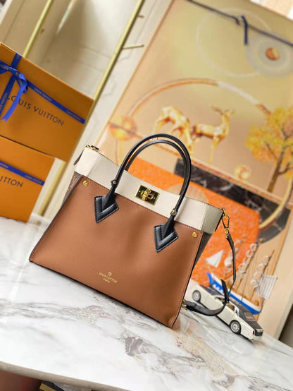 Leather and canvas combined handbag lbcase