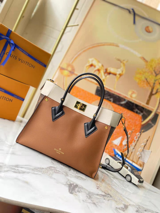 Leather and canvas combined handbag lbcase