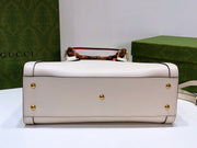 G u c c i white 20x 16x 10 or 27x 24x 11