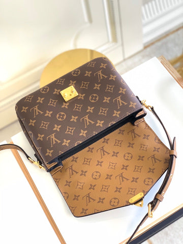 metis brown handbag