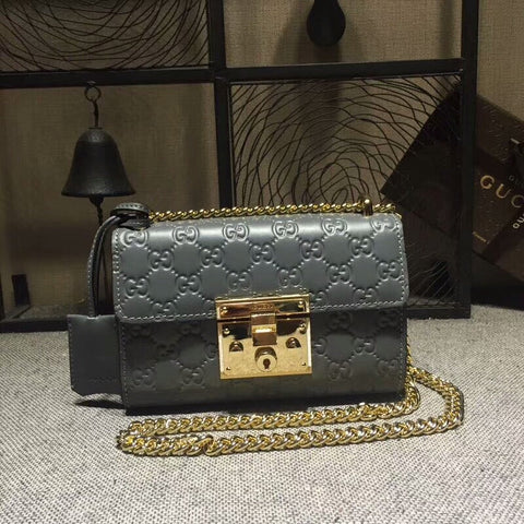 metal lock hand bag