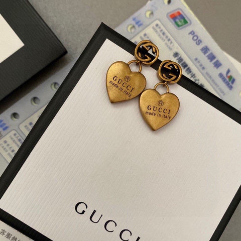 G u c c I earrings