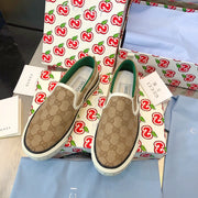 G u c c I baja slip on