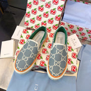 G u c c I baja slip on