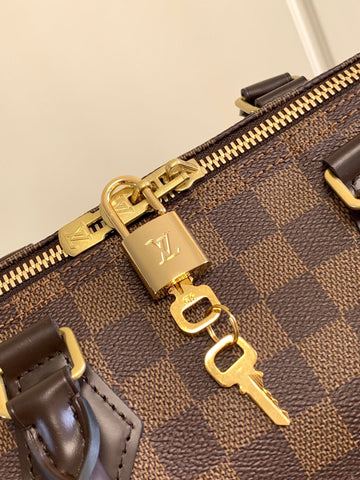 Brown color handbag speedy 30 cm