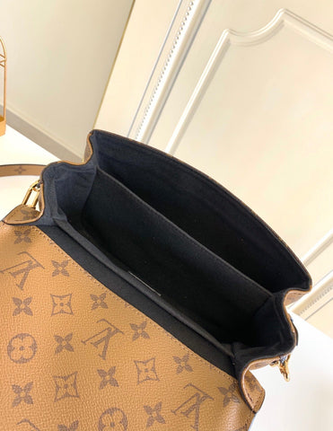 metis brown handbag