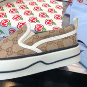 G u c c I slip ons