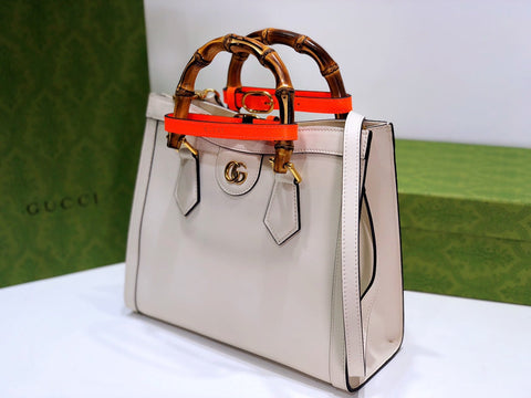 G u c c i white 20x 16x 10 or 27x 24x 11