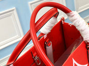 L red tote handbag